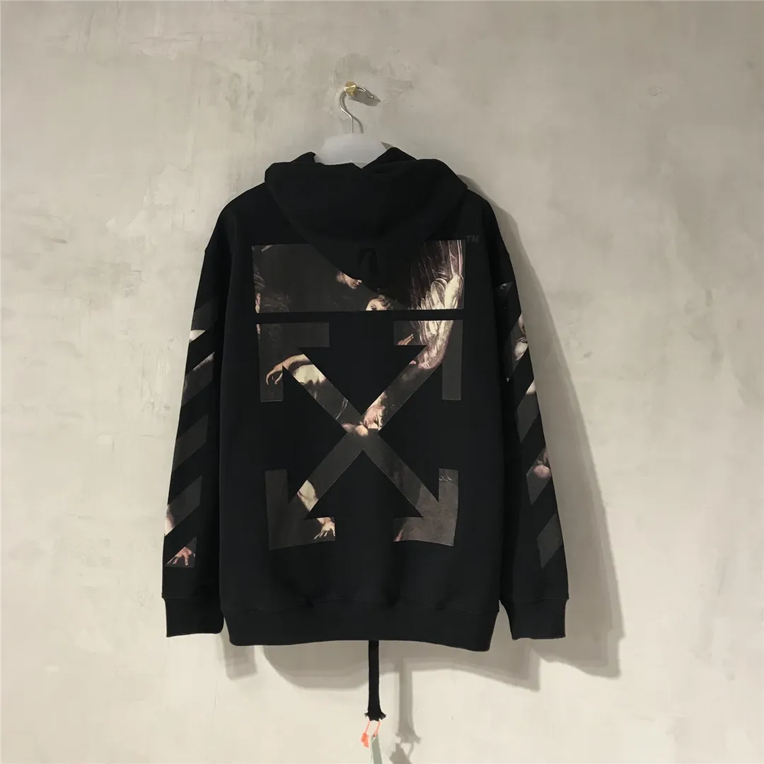 Top tested version OFF WHITE OW Certified Angel Wings Madonna Religious Oil Painting Men's and Women's Round Neck Zipper Cardigan Sweater The A mark on the neckline is a 3M reflective mark, customized model, not an embroidery mark, first look for identification.  The Renaissance-themed Caravaggio Madonna oil painting is inspired by one of Caravaggio's famous oil paintings, with a strong religious color! World treasures, top-notch paintings, and walking art pieces follow the original craftsmanship and use 5-color glue to create an effect. It is not offset printing, but many people on the market use Kornit direct inkjet instead. Whether it is the top version, touch the printing with your hand. The correct process is that it has a frosted feel. This is also a way to identify the uniqueness of the product. The fabric is 100% combed cotton terry fabric, 480 grams, ensuring the originality of the craftsmanship! Secondly, the tag rope of this model hangs from the collar tag, not the side rope. Customized auxiliary materials, complete accessories, consistent zp, hang tags, collar labels, and washed labels, feel free to compare!   Color: Black White Size Chart